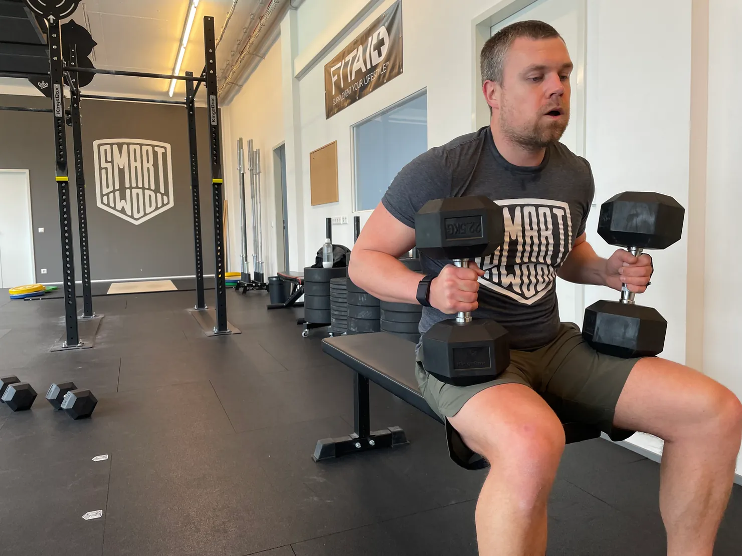 Athlete with two dumbbells