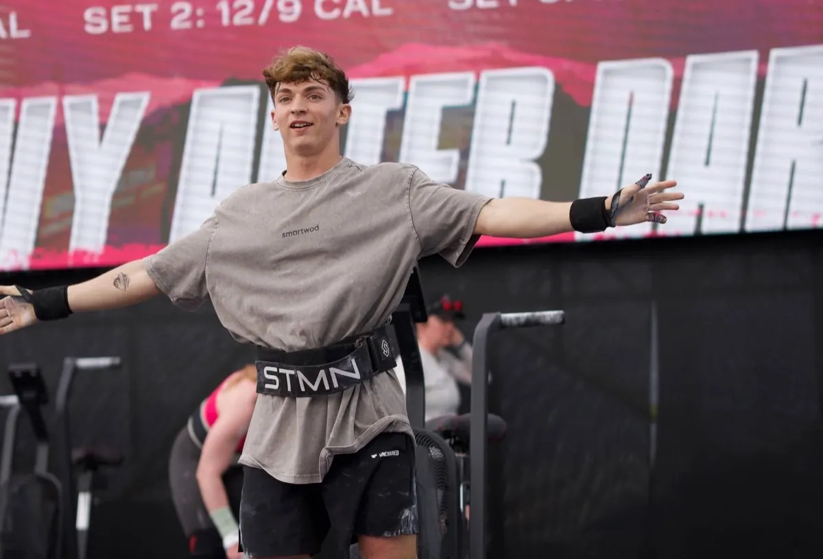 Lorenzo Ursini with his arms spread wide at a CrossFit competition