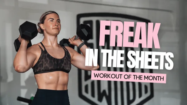 SmartWOD Workout of the Month August: athlete with two dumbbells on her shoulders and the Freak in the Sheets banner